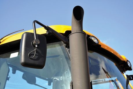 exhaust pipe and side-view mirror of a tractor